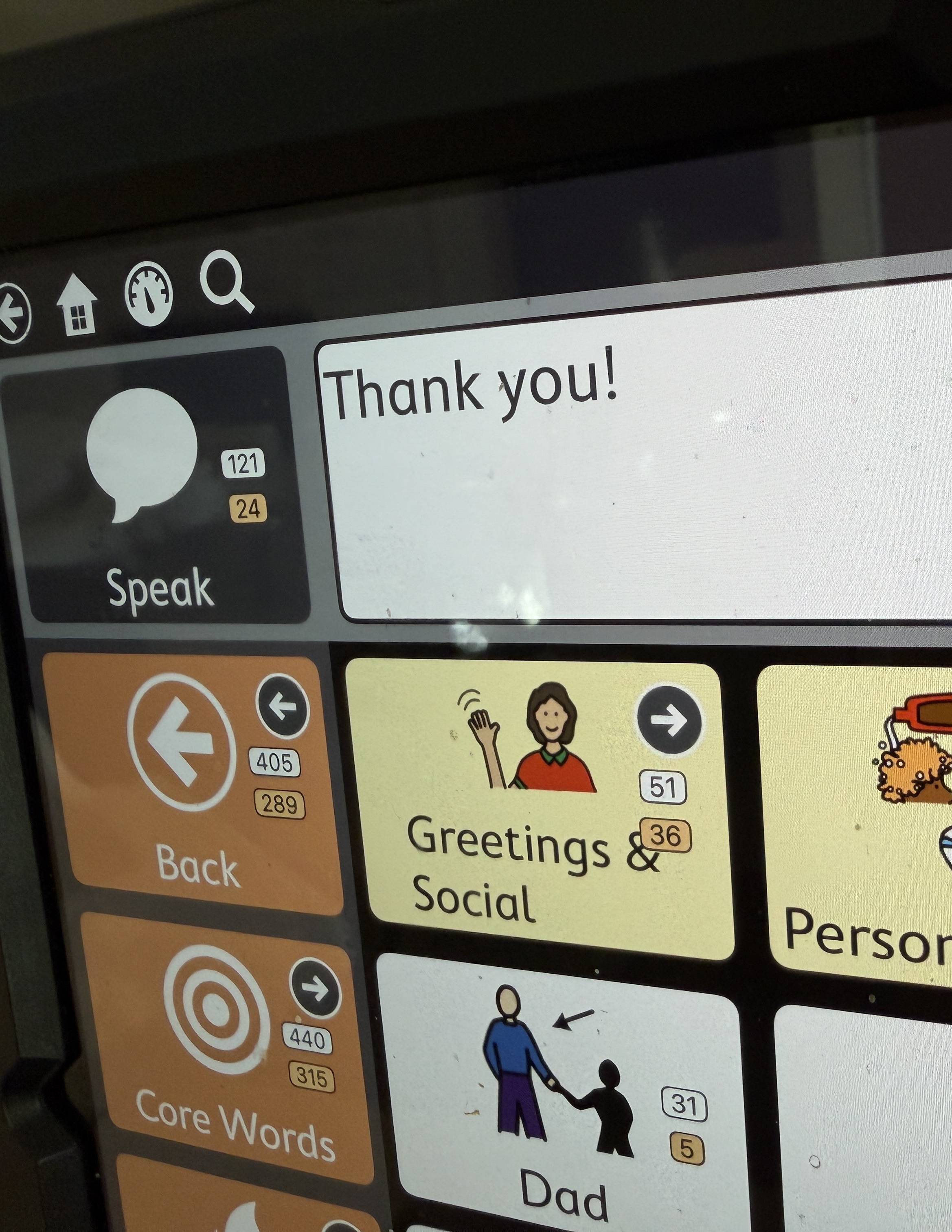 An AAC device displaying the message Thank you.